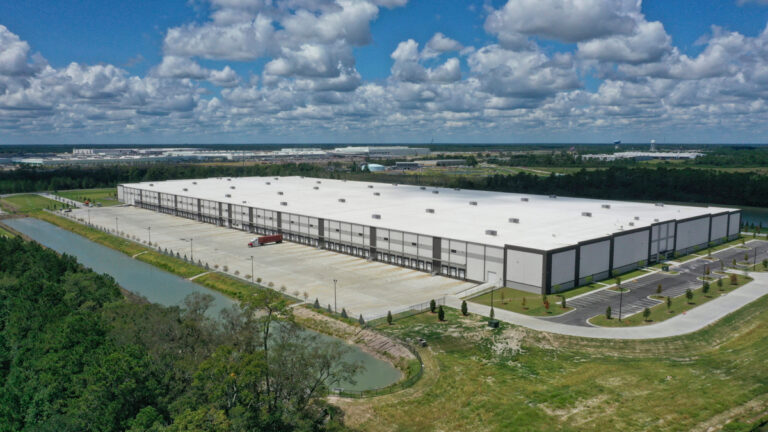 Aerial view of a large warehouse facility with loading docks
